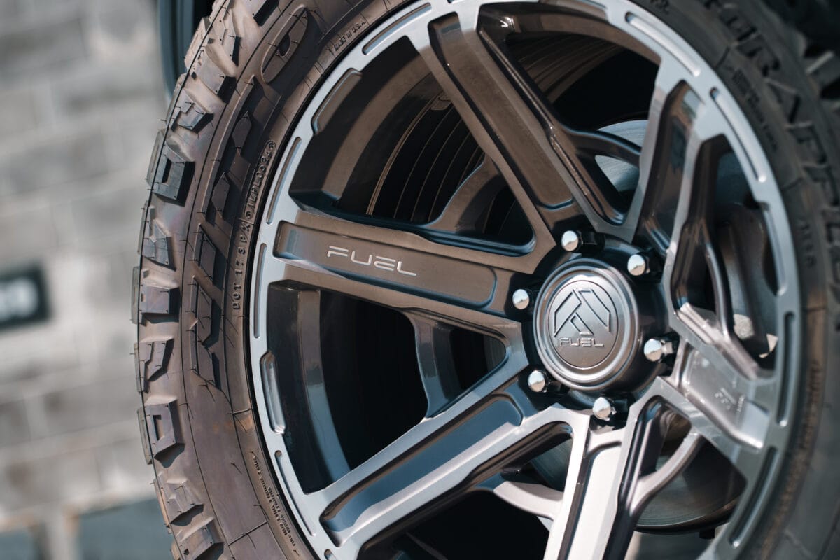 Close-up of Fuel brand tire and alloy wheel.