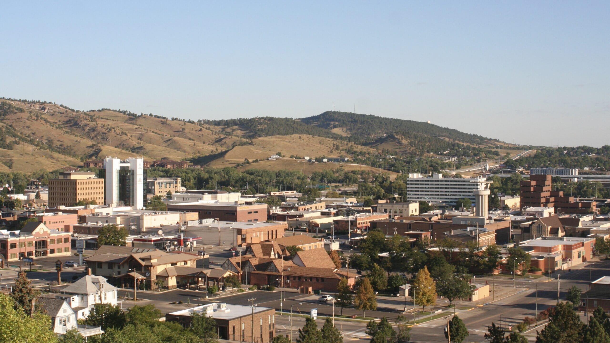 Rapid City skyline with hills in background.