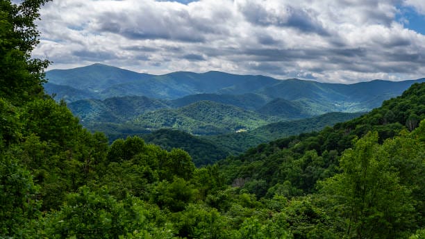 Scenic mountain landscape under cloudy sky