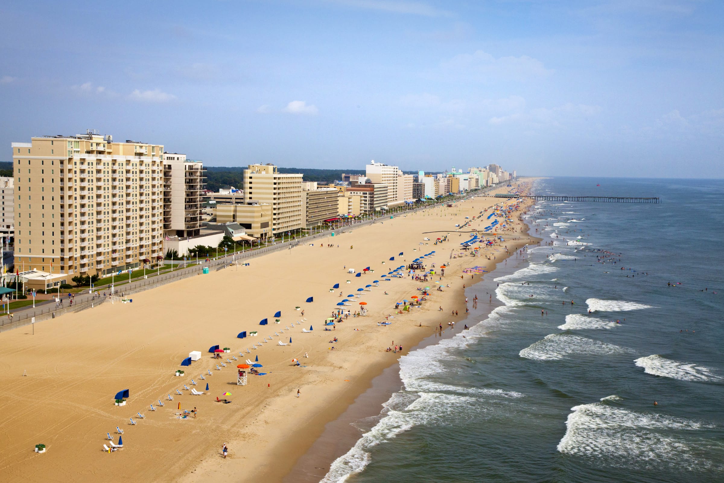 Virginia Beach oceanfront with hotels and pier view.