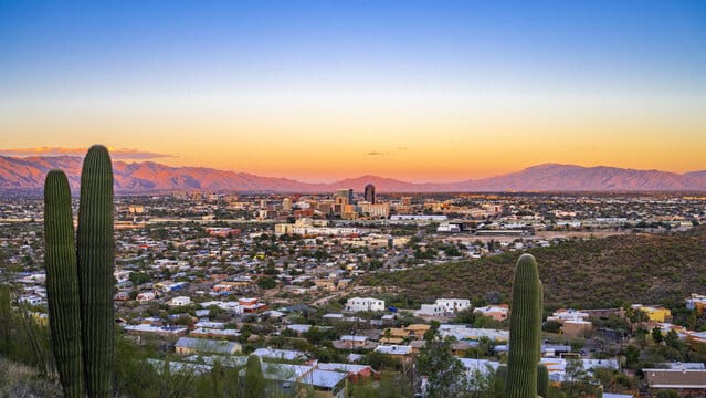 Sunset view over Tucson with mountains.