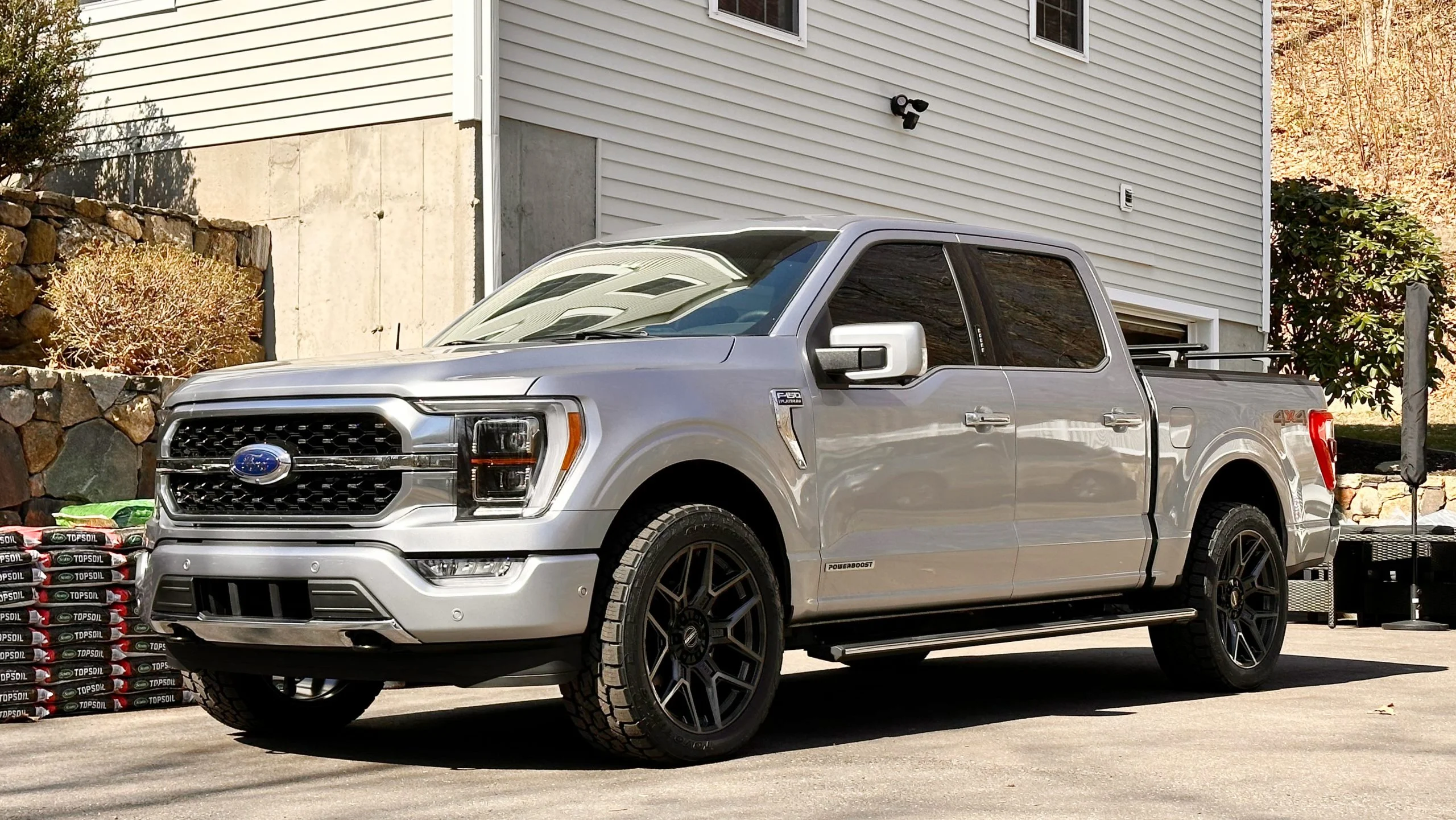 Silver pickup truck parked in driveway