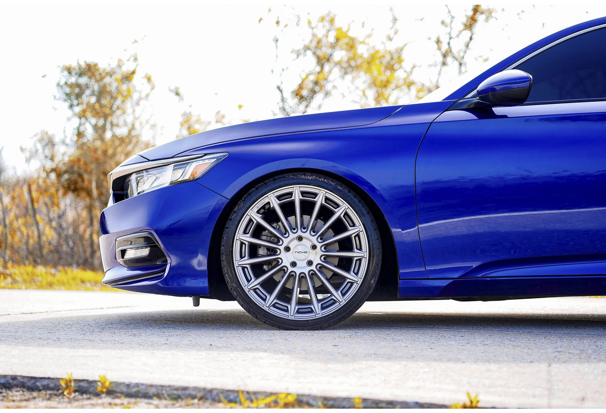 Blue car with custom alloy wheels parked outside. Honda Accord Wheels